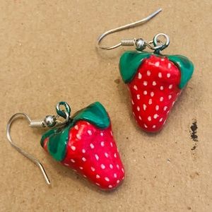 Handmade clay strawberry earrings.